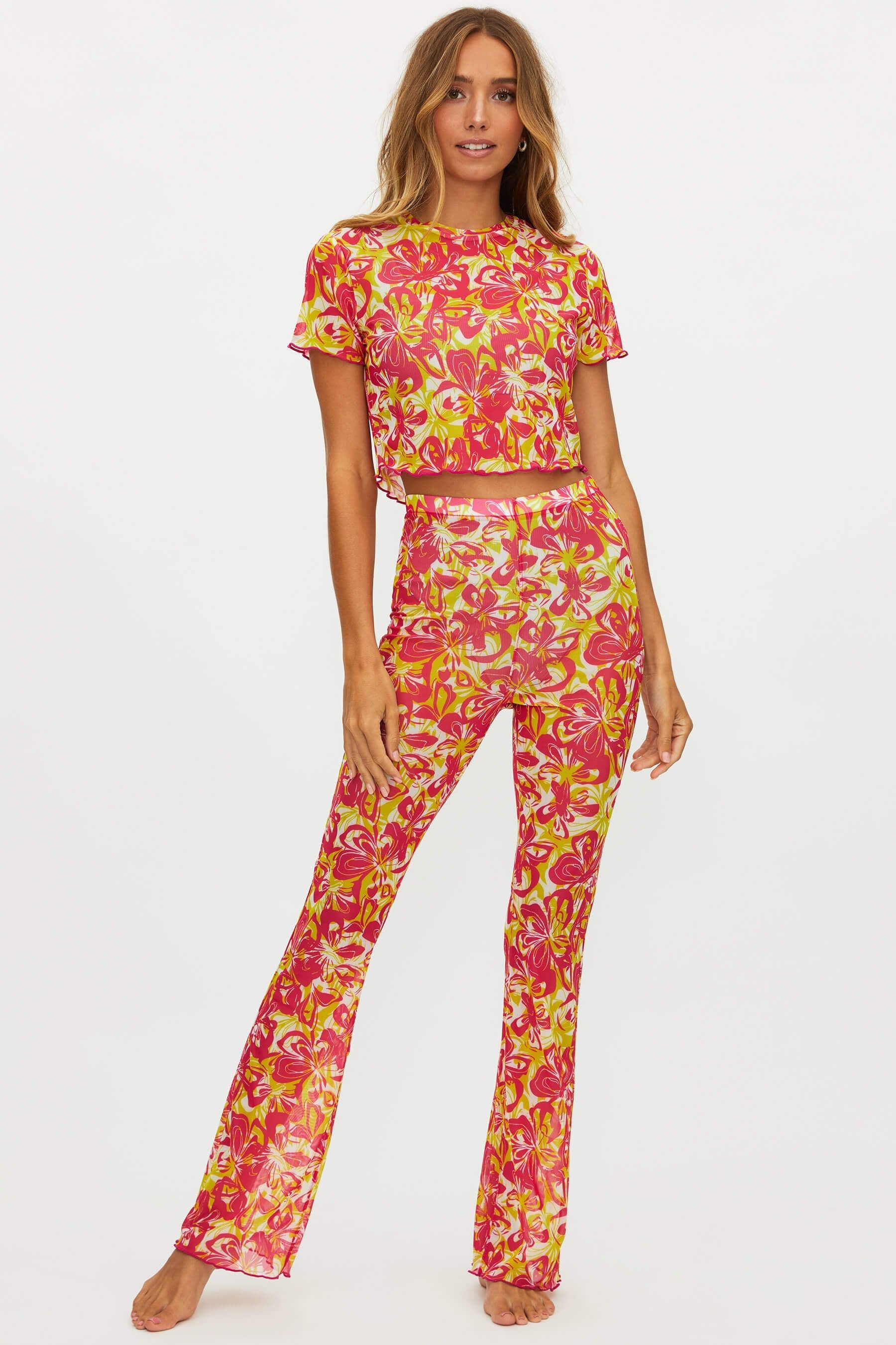 Jackie Pant Hyper Hibiscus sold by Beach Riot