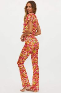 Jackie Pant Hyper Hibiscus sold by Beach Riot