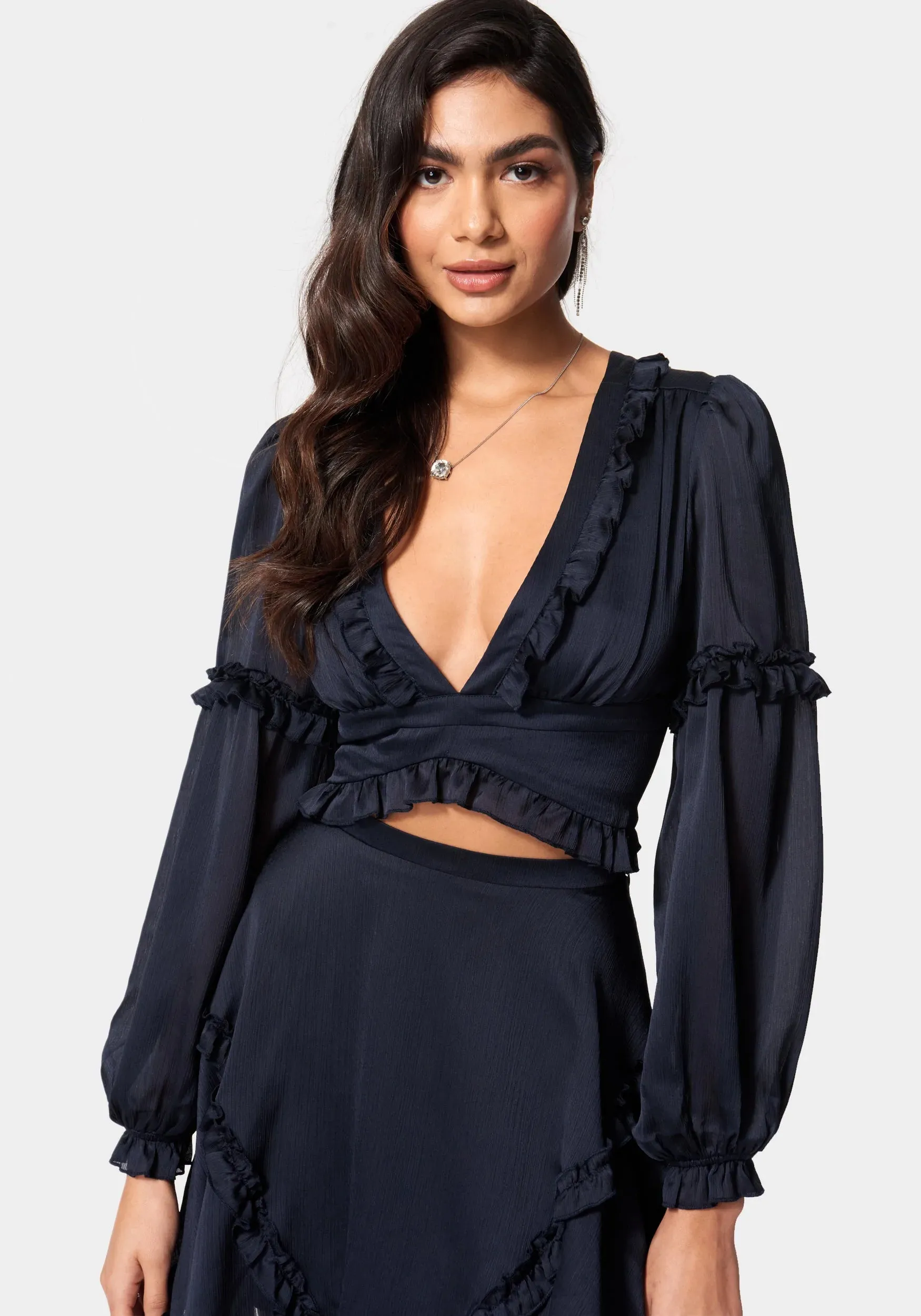 Yoryu Ruffle Wrap Top sold by Bebe