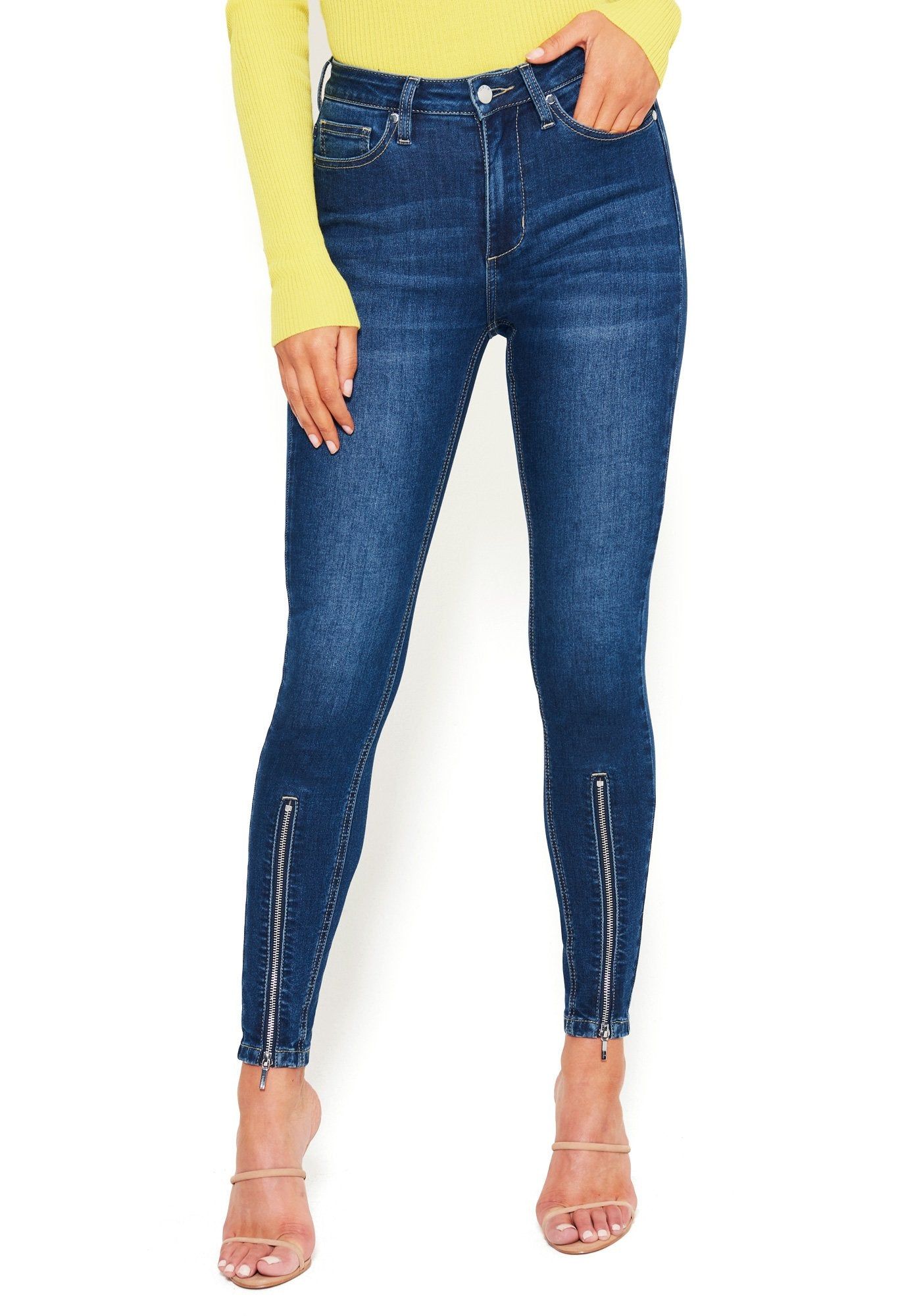 Zipper Detail Skinny Jeans sold by Bebe