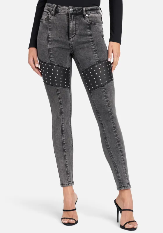 Acid Wash Stud Detail Skinny Jeans sold by Bebe