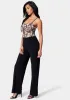 Sparkle Mesh Jumpsuit sold by Bebe