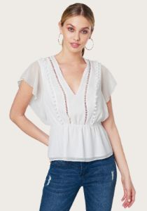 Pom-Pom Detail Top sold by Bebe
