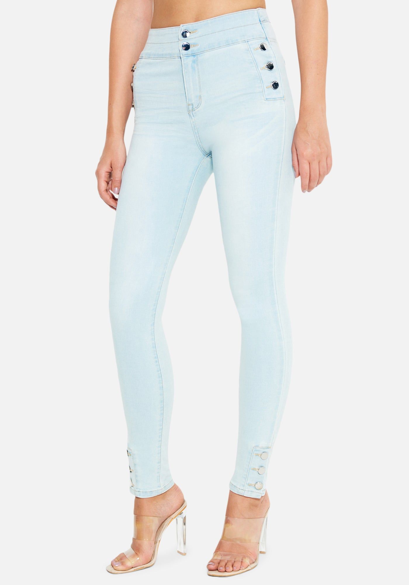 Button Detail Skinny Jeans sold by Bebe