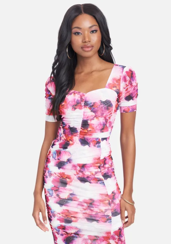 Printed Stretch Mesh Puff Sleeve Top sold by Bebe