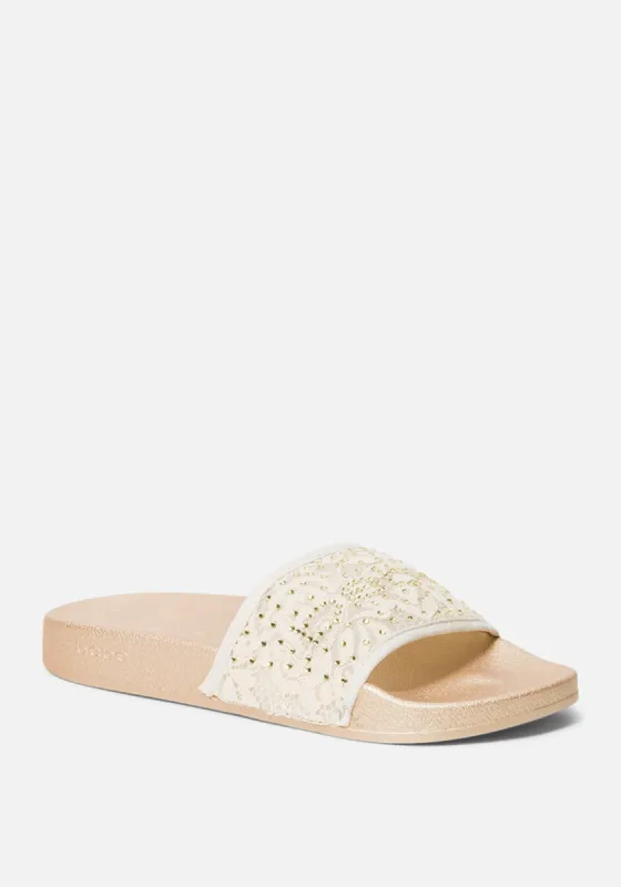 Flirtie Rhinestone Slides sold by Bebe