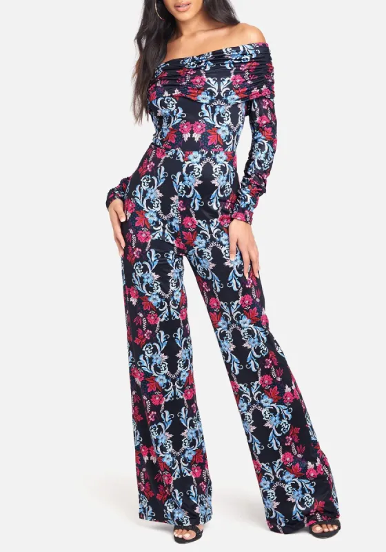Printed Off Shoulder Slinky Jumpsuit sold by Bebe