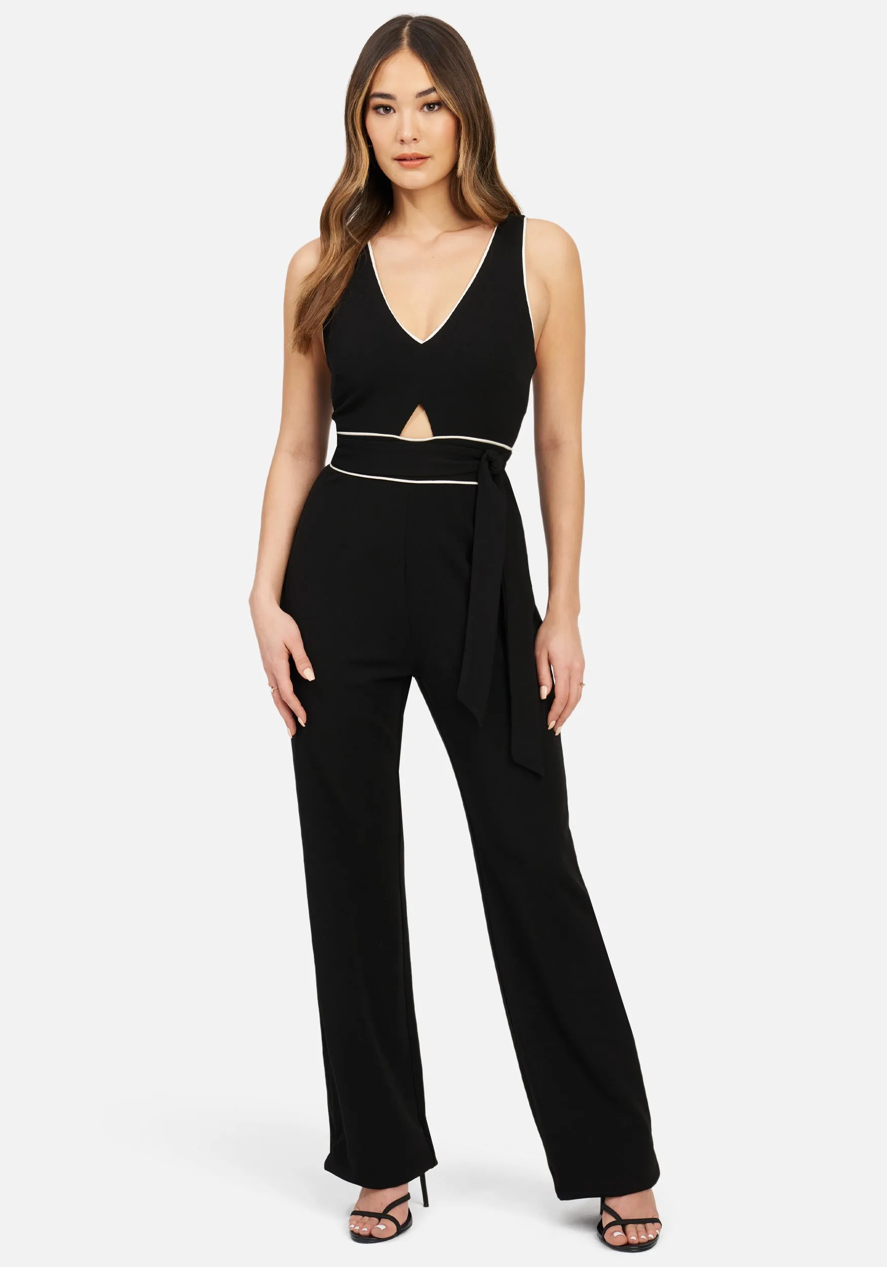 Knit Crepe Jumpsuit W/ Front Cutout & Contrast Piping sold by Bebe