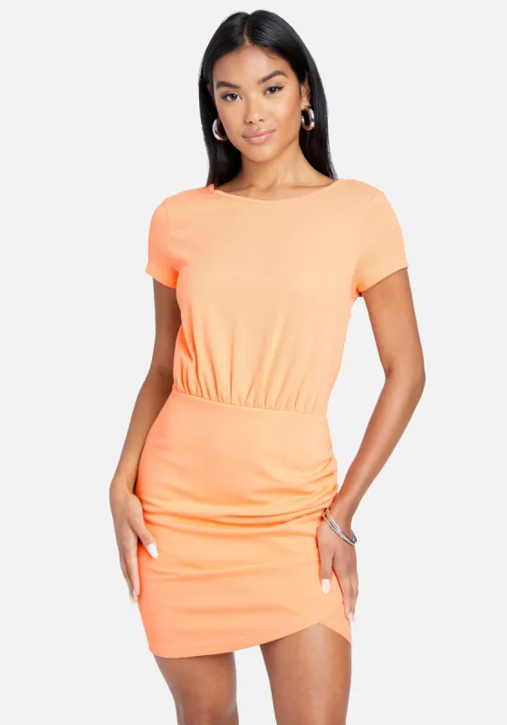 Surplice Mini T-Shirt Dress sold by Bebe