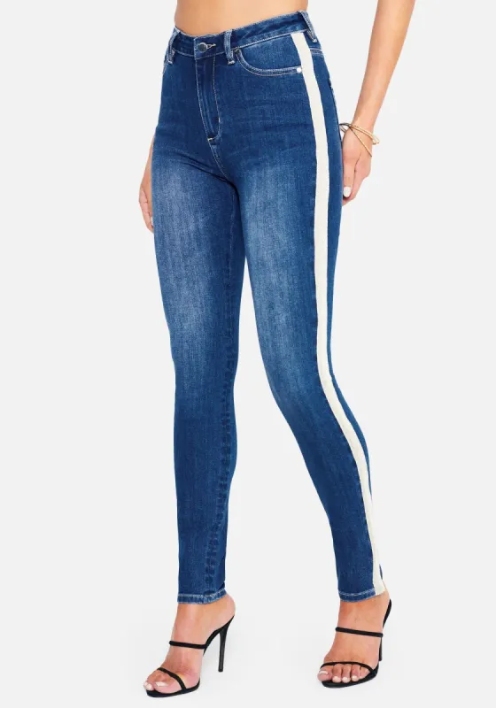 Stripe Side Detail Skinny Jeans sold by Bebe