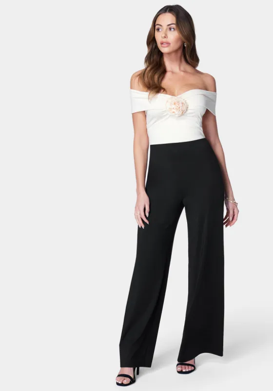 Off Shoulder Rosette Jumpsuit sold by Bebe