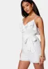 Eyelet Ruffle Romper sold by Bebe