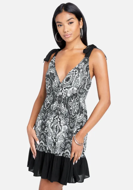 Tie Shoulder Printed Fit And Flare Dress sold by Bebe