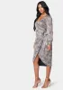 Sparkle Wrap Dress sold by Bebe
