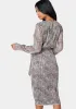 Sparkle Wrap Dress sold by Bebe