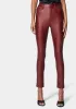 Coated Denim Skinny Jean sold by Bebe