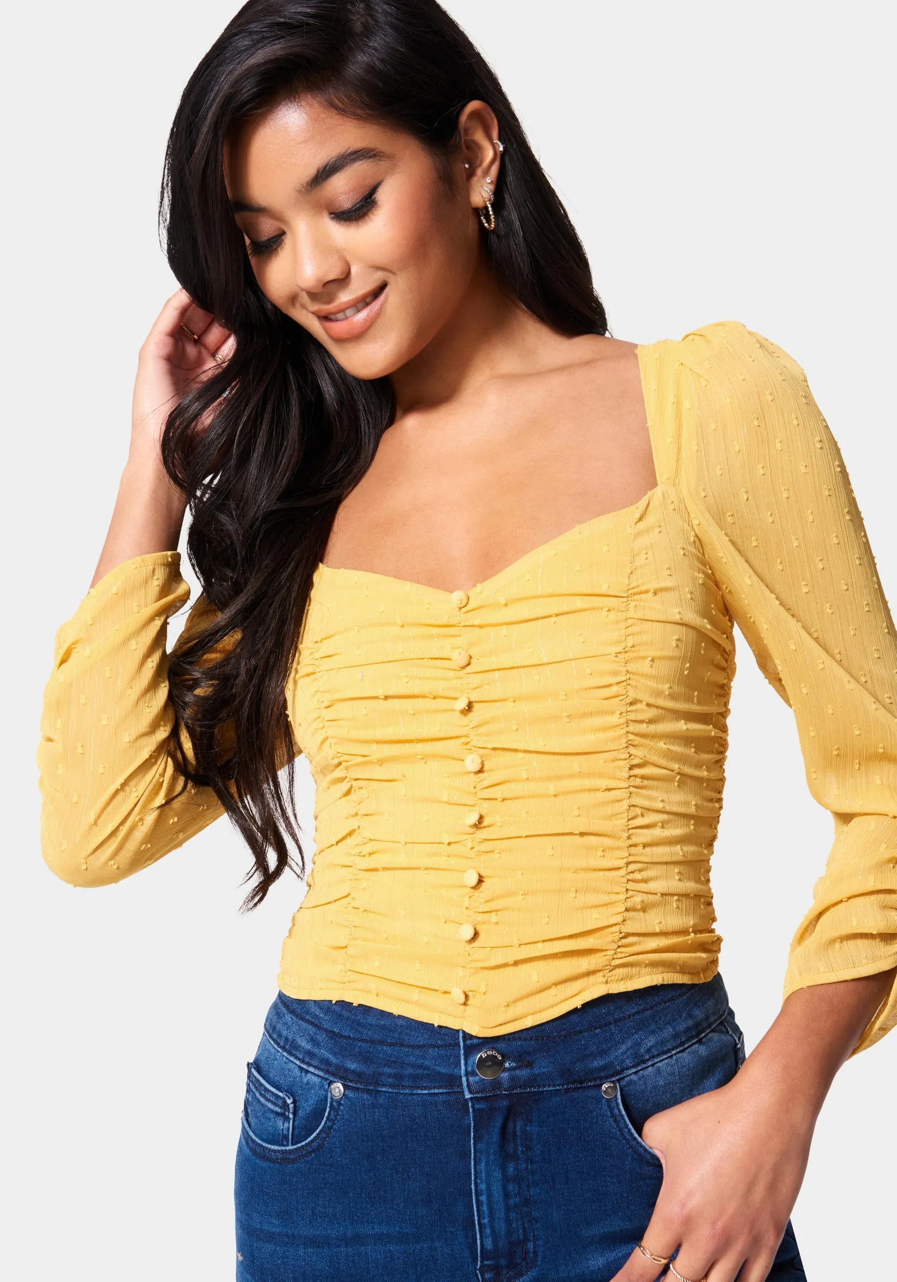 Puff Sleeve Ruched Woven Top sold by Bebe