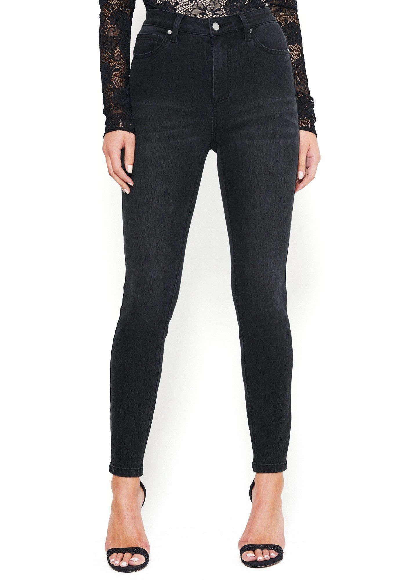 Back V-Stitch Skinny Jeans sold by Bebe