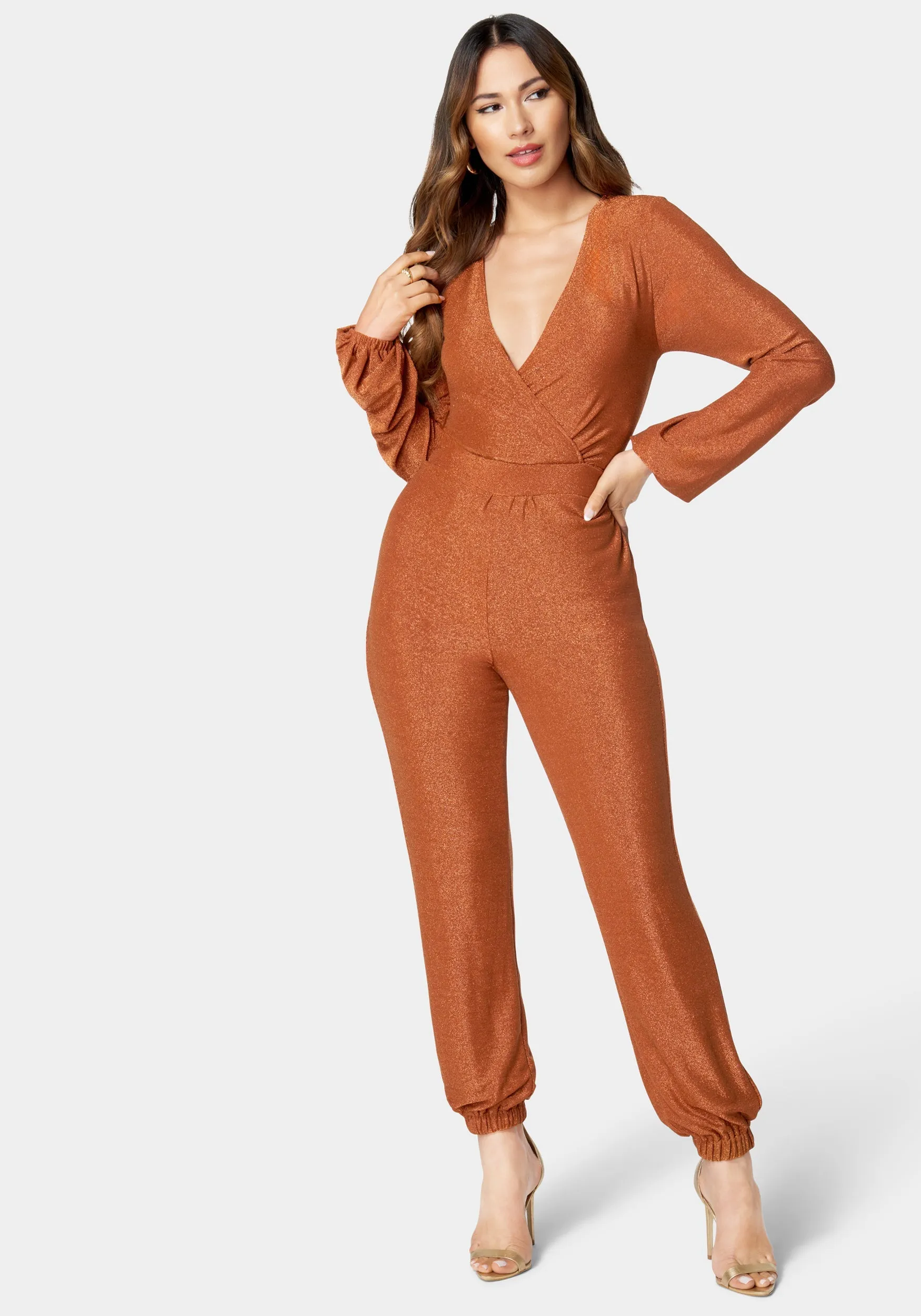 Sparkle Knit Long Sleeve Jumpsuit sold by Bebe