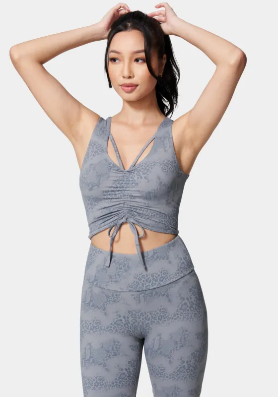 Bebe Logo Foiled Print Ruched Front Knit Top sold by Bebe