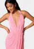 Slinky Asymmetrical Halter Neck Dress sold by Bebe