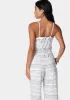 Smocked Waist Halter Jumpsuit sold by Bebe