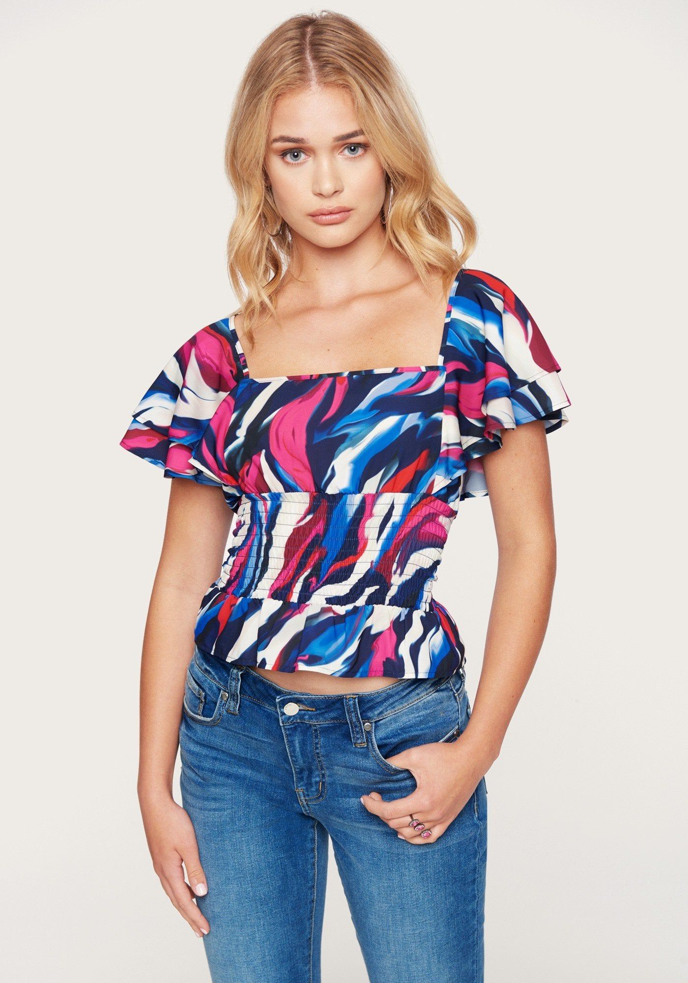 Print Flutter Sleeve Top sold by Bebe