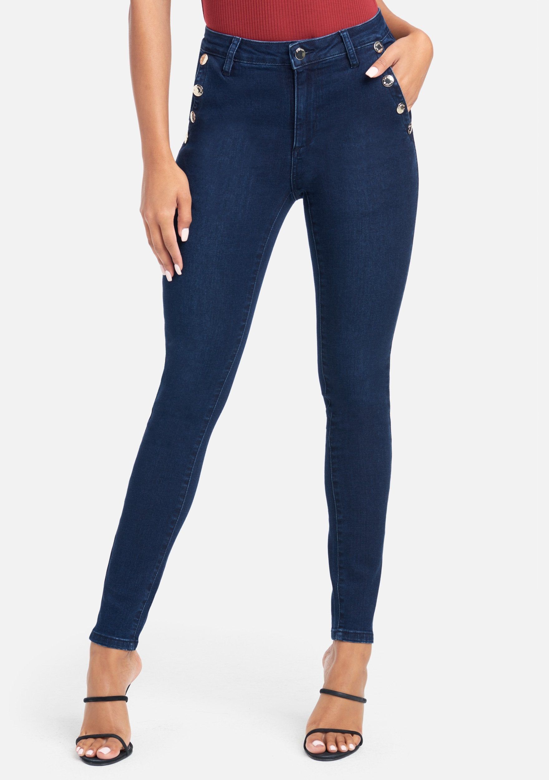 Button Detail Skinny Jeans sold by Bebe