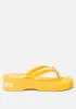 Kim Wedge Flip Flops sold by Bebe