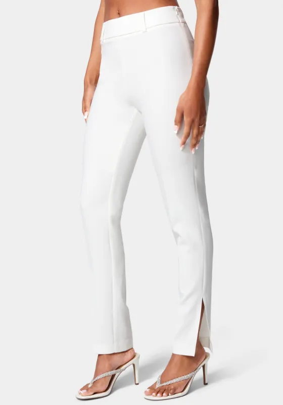 Side Slit Slim Leg Woven Pant sold by Bebe