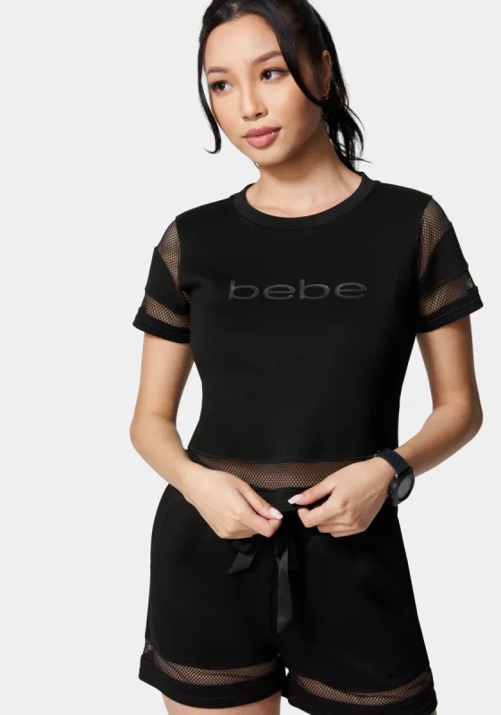 Bebe Logo Mesh Inserts Scuba Top sold by Bebe