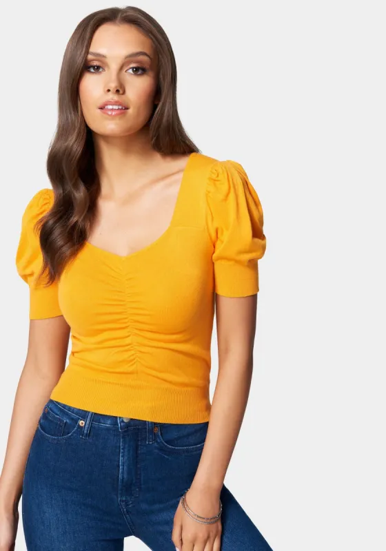 Puff Sleeve Ruched Sweater Top sold by Bebe