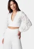 Balloon Sleeve Button Front Eyelet Blouse sold by Bebe