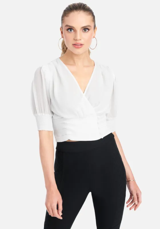 Crossover Crepe 3/4 Sleeve Top sold by Bebe