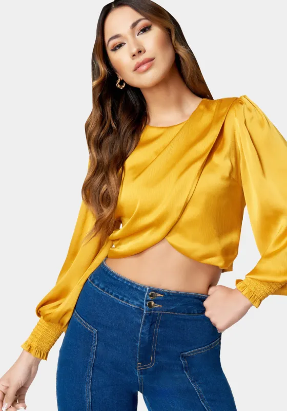 Round Neck Surplice Front Blouse sold by Bebe