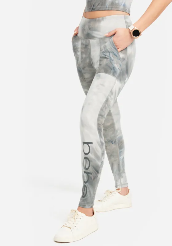 Bebe Tie Dye Pocket Legging sold by Bebe