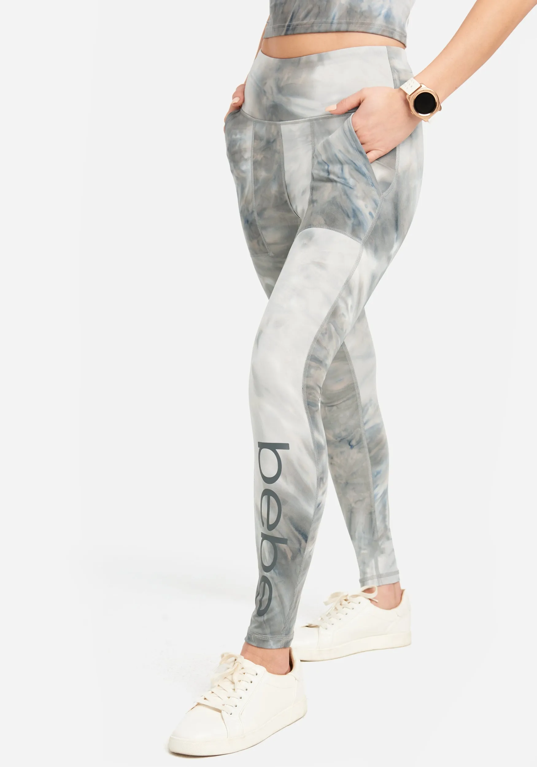 Bebe Tie Dye Pocket Legging sold by Bebe