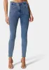 High Waist Patch Pocket Skinny Leg Jeans sold by Bebe