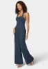 Halter Neck Buckle Detail Wide Leg Denim Jumpsuit sold by Bebe