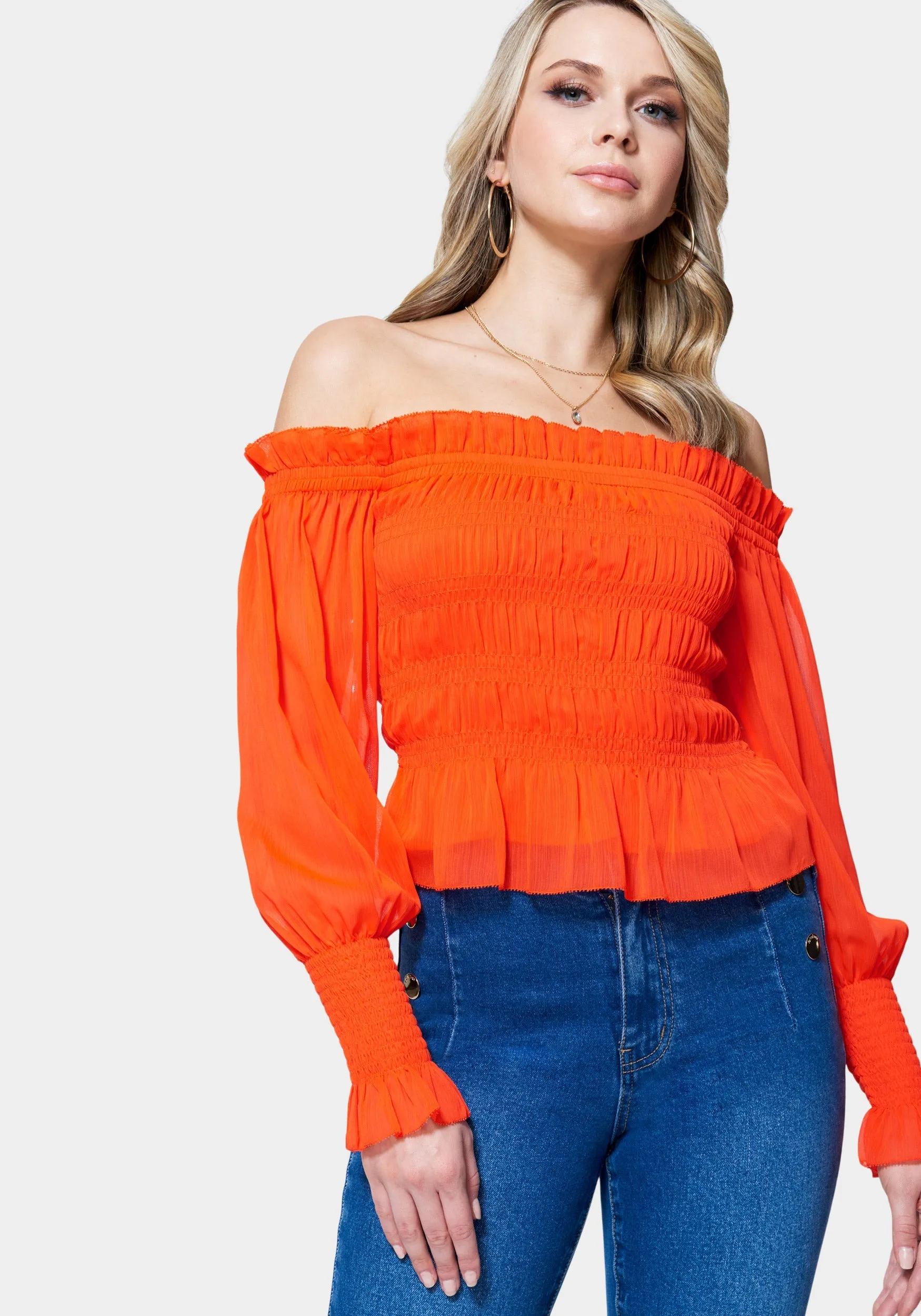 Long Sleeve Smocked Off Shoulder Top sold by Bebe
