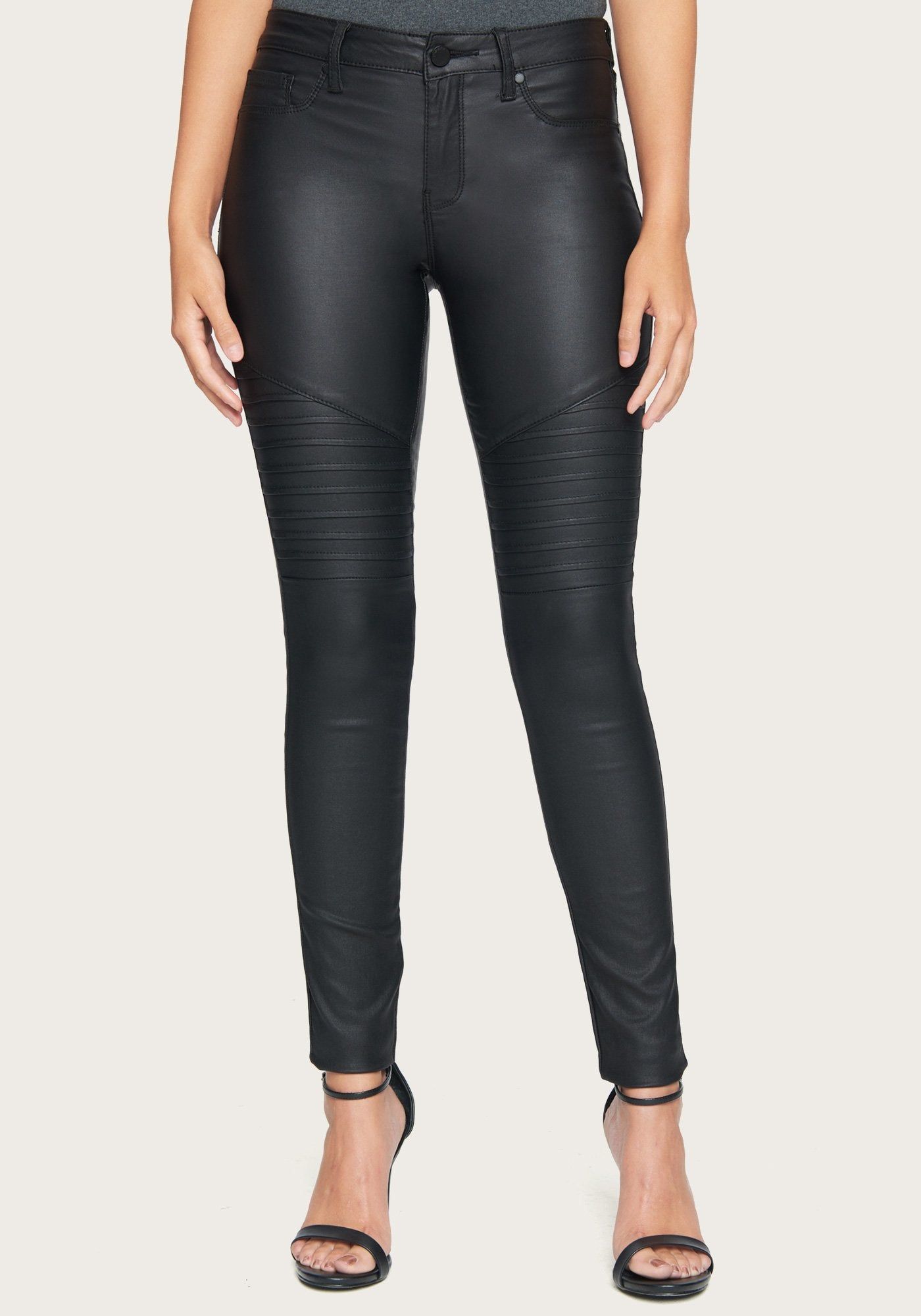 Coated Moto Skinny Jeans sold by Bebe
