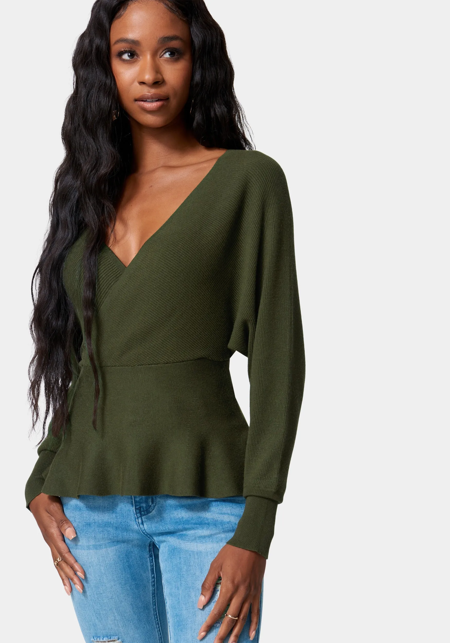 Cross Front Peplum Sweater sold by Bebe