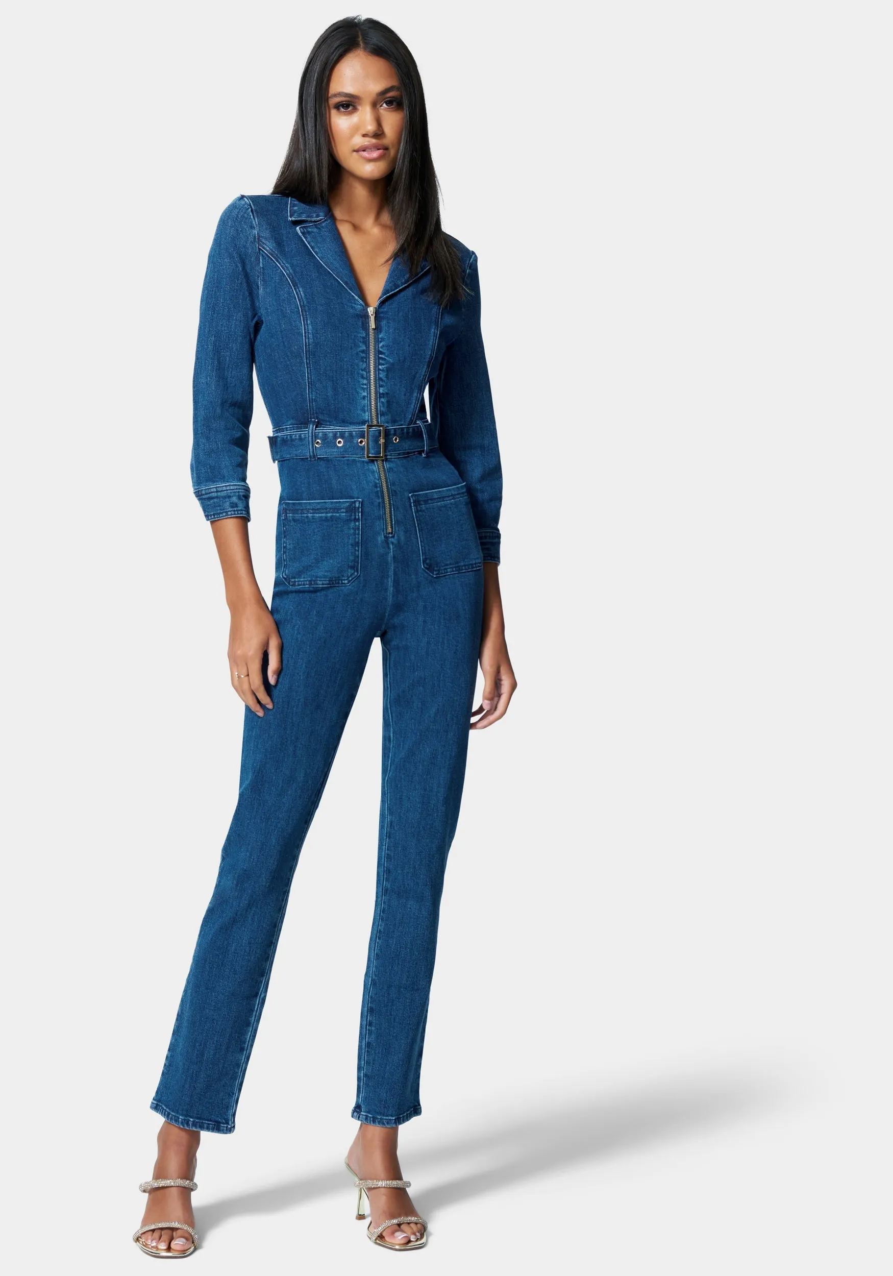 Zip Front Belted Skinny Leg Denim Jumpsuit sold by Bebe