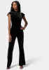 Ruffle Sleeve Flare Leg Velvet Jumpsuit sold by Bebe