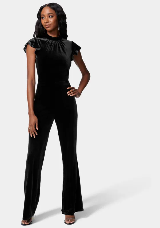Ruffle Sleeve Flare Leg Velvet Jumpsuit sold by Bebe