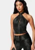 Vegan Leather Cross Front Top sold by Bebe