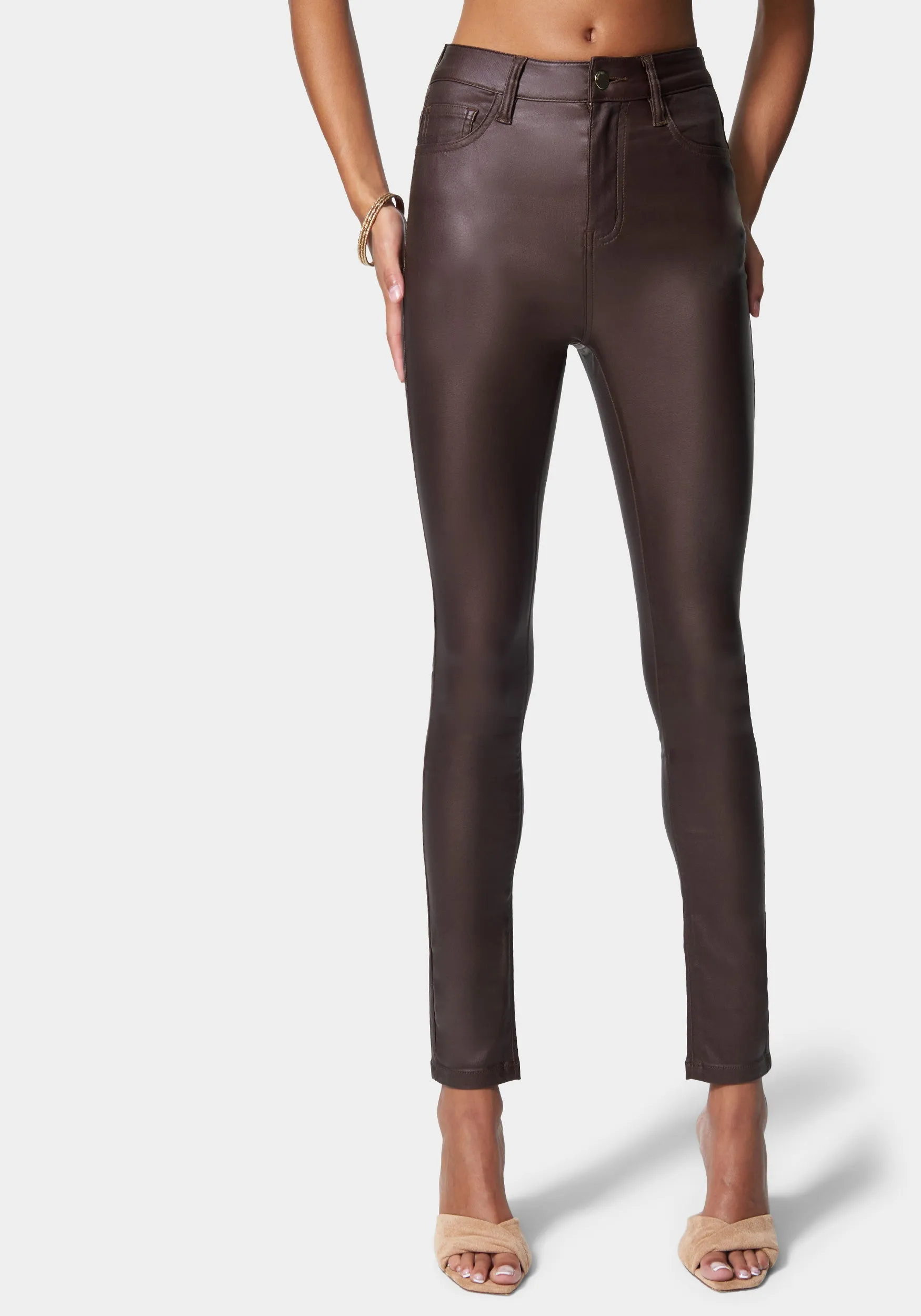 Coated Denim Skinny Jean sold by Bebe