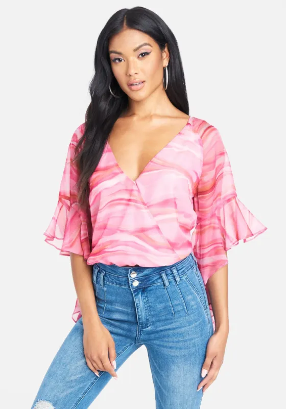 Printed Crossover Flowy Sleeve Top sold by Bebe