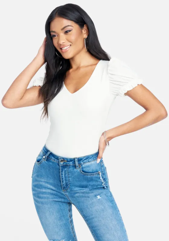 Puff Short Sleeve Fitted Top sold by Bebe
