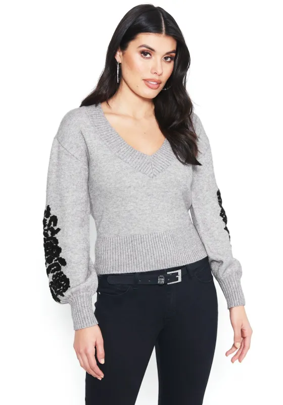 Embroidered Chenille Sweater sold by Bebe